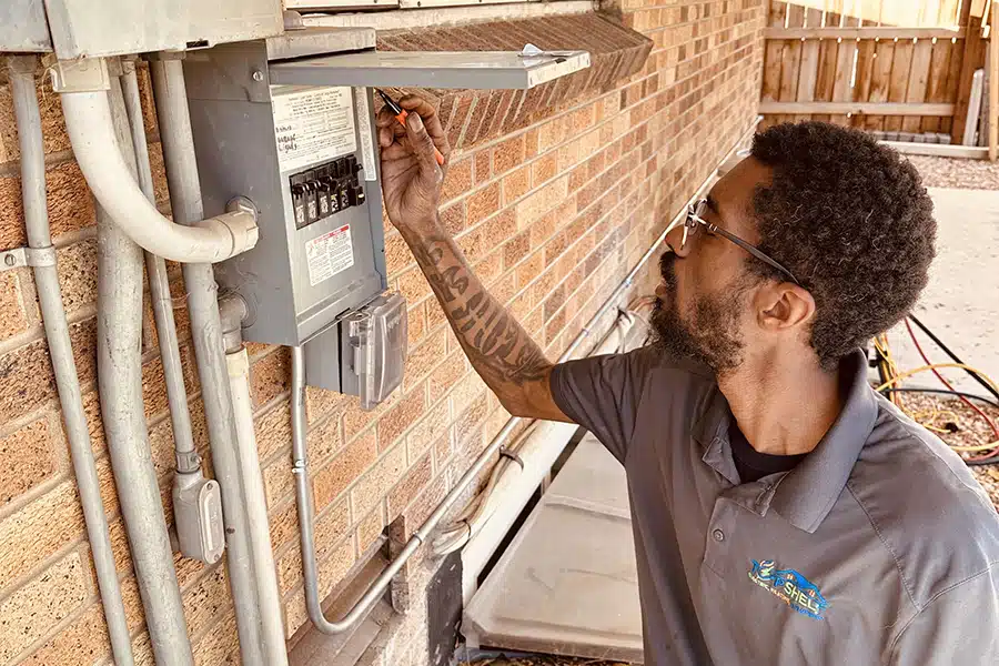 Top Shelf electrician completing electrical wiring check at Denver CO home