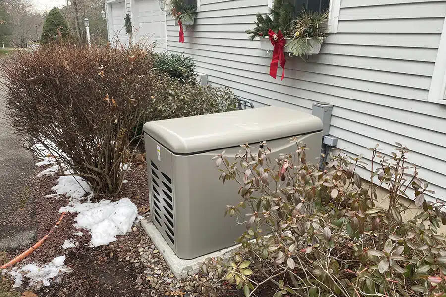 residential generator outside Denver CO home in winter